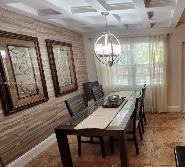 dining space featuring beam ceiling, a notable chandelier, coffered ceiling, and baseboards