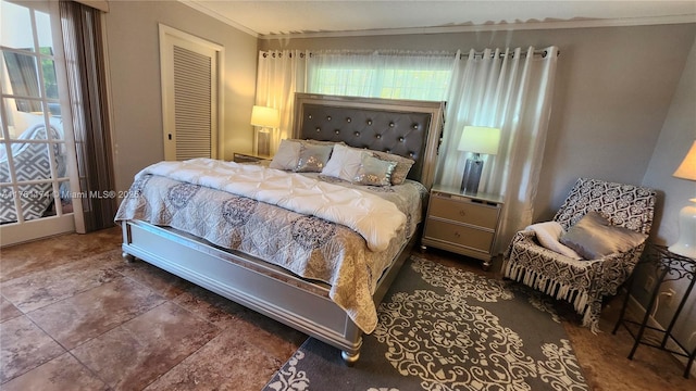 bedroom with crown molding and a closet