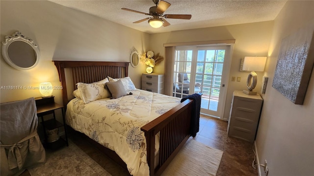 tiled bedroom with access to exterior, a textured ceiling, and a ceiling fan