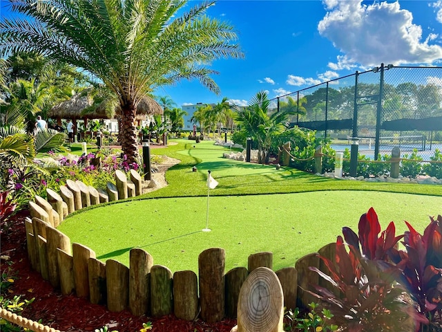 surrounding community featuring fence