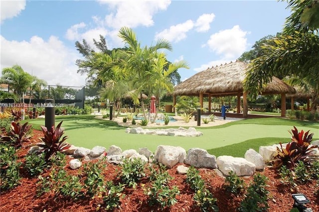 surrounding community featuring a gazebo and golf course view