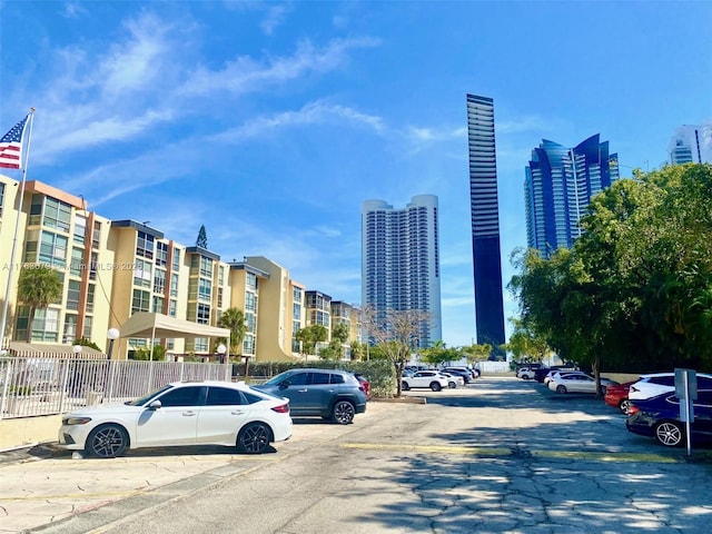 exterior space featuring a view of city and uncovered parking