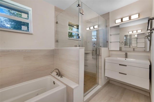 13390 SW 26th St, Davie, FL 33325 - full bathroom featuring a whirlpool tub, vanity, and a shower stall