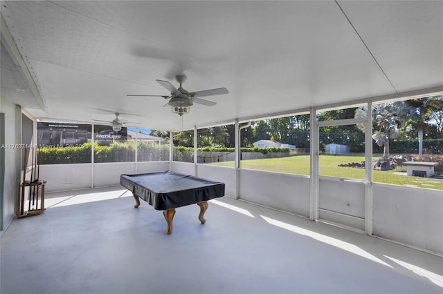 sunroom featuring pool table and ceiling fan