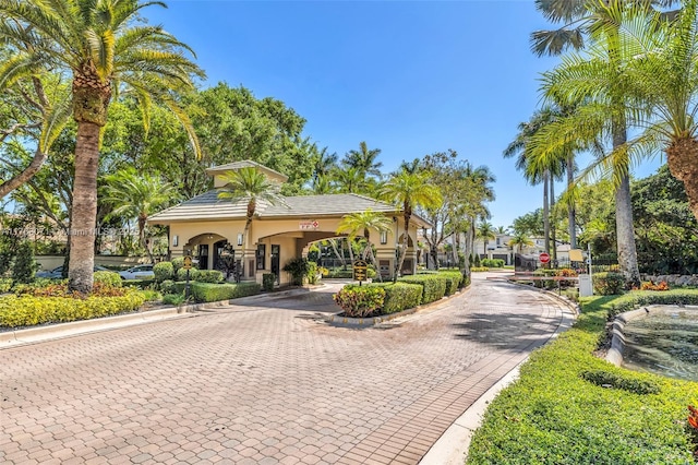 view of community featuring decorative driveway