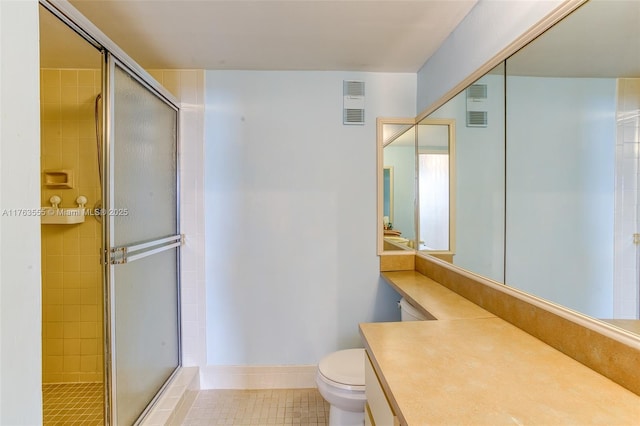 bathroom with visible vents and a shower stall