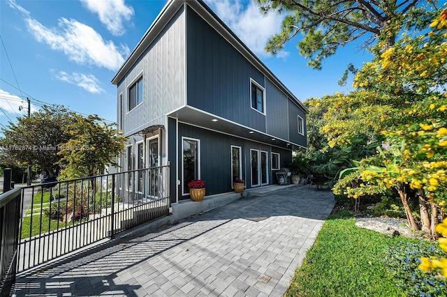 rear view of house with a patio