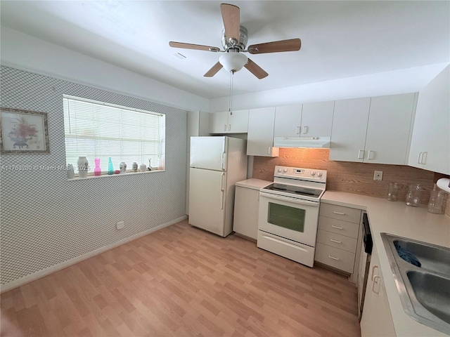 17202 SW 113th Ct Unit 21943A, Miami, FL 33157 - kitchen with under cabinet range hood, white appliances, light countertops, and light wood finished floors