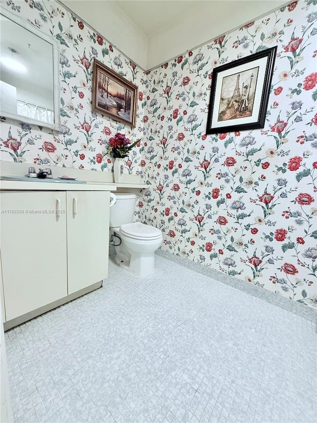 17202 SW 113th Ct Unit 21943A, Miami, FL 33157 - half bathroom featuring wallpapered walls, tile patterned floors, toilet, and vanity