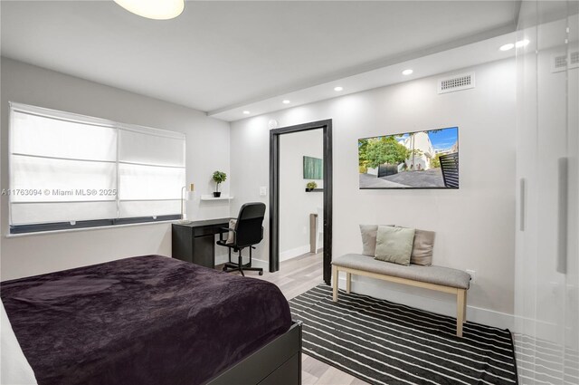 619 Euclid Ave Unit 1B, Miami Beach, FL 33139 - bedroom with recessed lighting, wood finished floors, and baseboards
