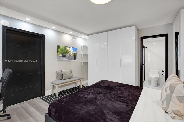 619 Euclid Ave Unit 1B, Miami Beach, FL 33139 - bedroom featuring light wood-style floors, recessed lighting, and baseboards