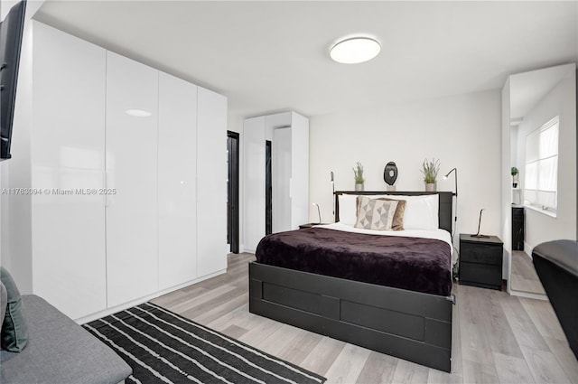 619 Euclid Ave Unit 1B, Miami Beach, FL 33139 - bedroom with light wood-style flooring