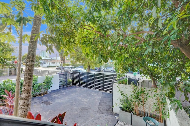 view of patio featuring fence