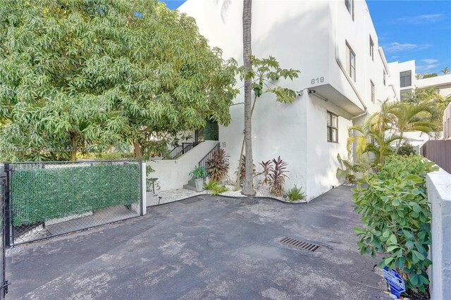 619 Euclid Ave Unit 1B, Miami Beach, FL 33139 - view of side of home featuring stucco siding