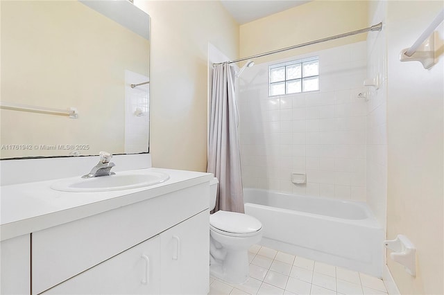 bathroom with vanity, tile patterned floors, toilet, and shower / bathtub combination with curtain