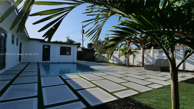 view of pool with a fenced backyard, a fenced in pool, and a patio