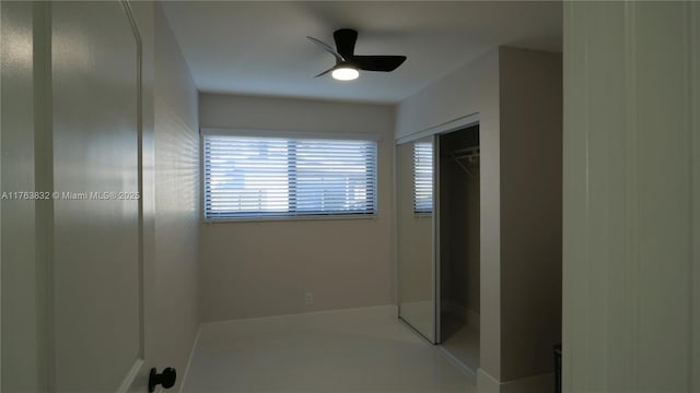 bathroom with a ceiling fan