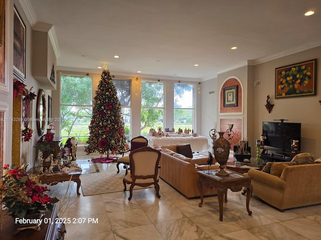 living area with a wealth of natural light, recessed lighting, and ornamental molding