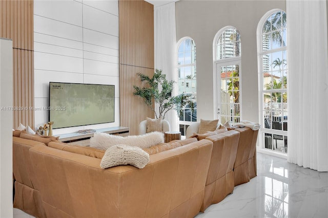 living room with marble finish floor