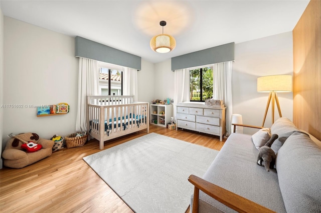 bedroom featuring wood finished floors