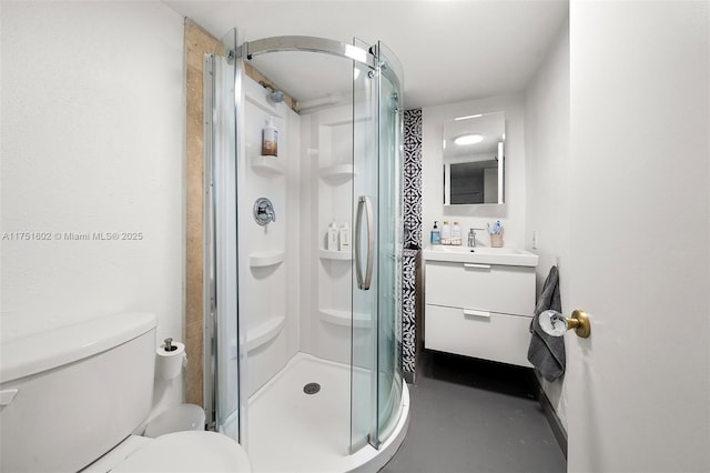 bathroom with toilet, a stall shower, vanity, and finished concrete flooring