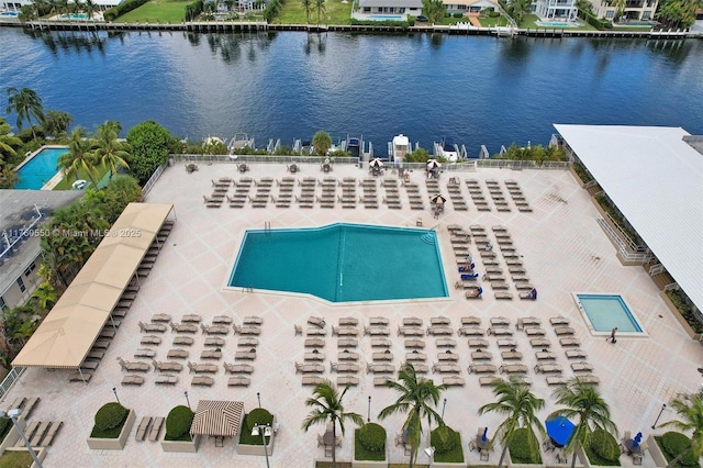 birds eye view of property featuring a water view