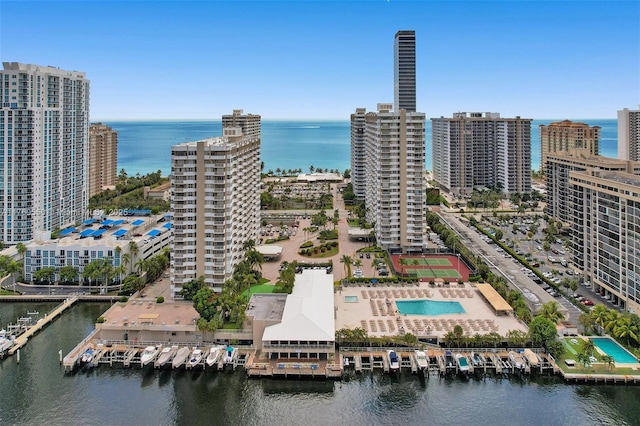 drone / aerial view with a view of city and a water view