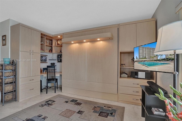 kitchen with open shelves and light brown cabinets