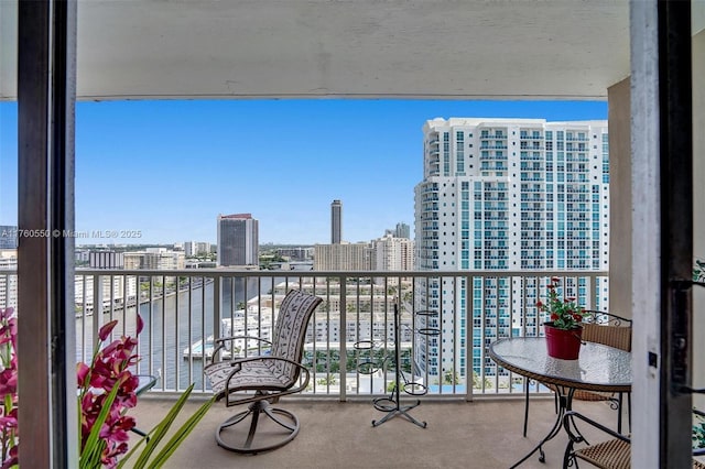 balcony featuring a city view