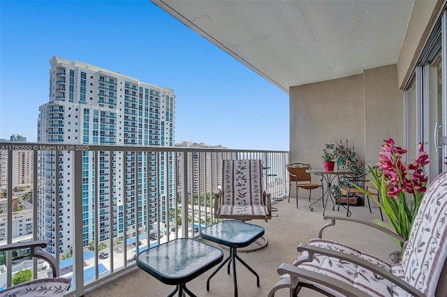 balcony featuring a city view