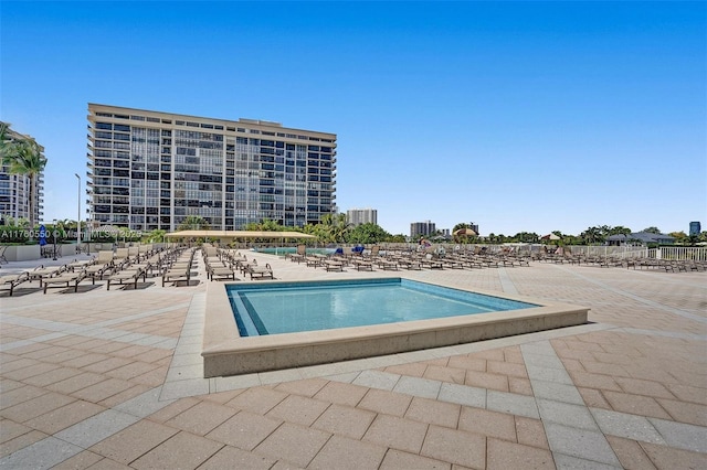 pool featuring a patio area