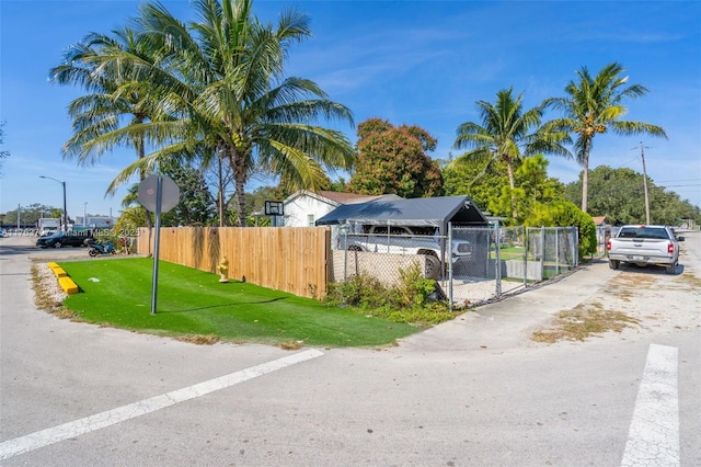 exterior space with a lawn and a fenced front yard