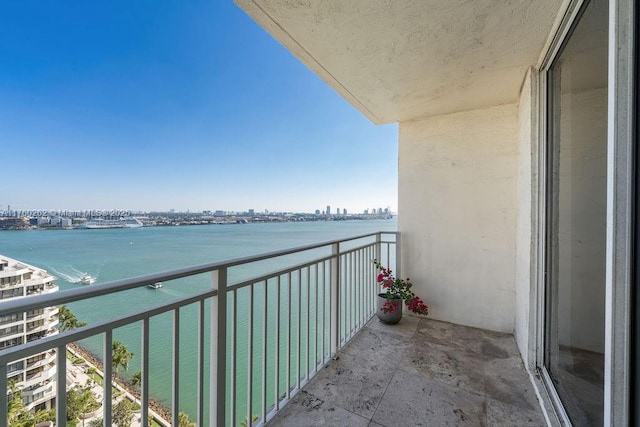 balcony with a city view and a water view