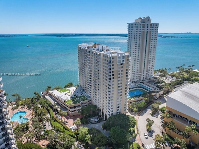 aerial view featuring a view of city and a water view