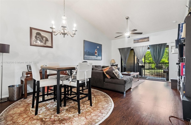 3059 Carambola Cir S Unit 2033, Coconut Creek, FL 33066 - dining room with dark wood-style flooring, a chandelier, a ceiling fan, and high vaulted ceiling
