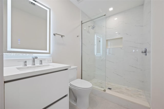 full bath with vanity, toilet, visible vents, and a marble finish shower