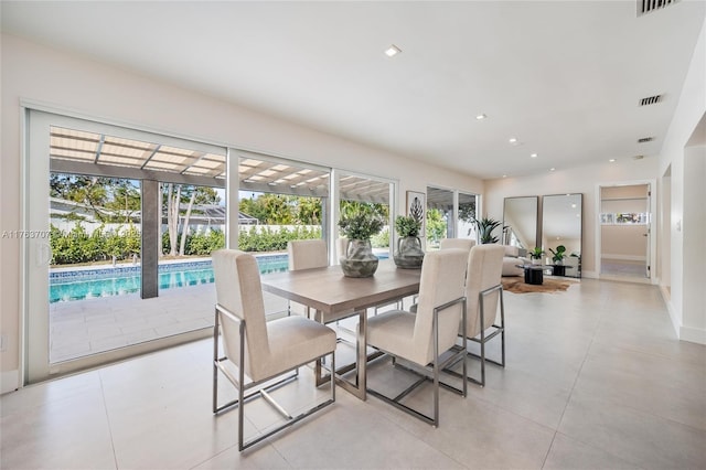 dining room with visible vents, recessed lighting, and baseboards