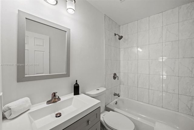 full bathroom with toilet, vanity, and bathtub / shower combination