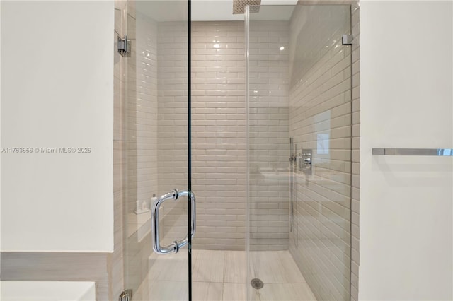 full bathroom with a shower stall