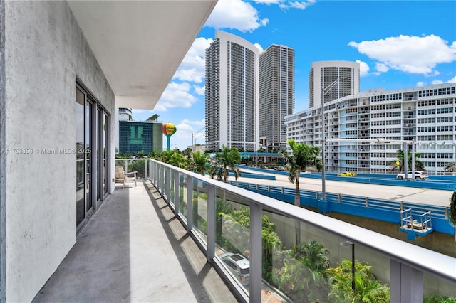 balcony featuring a view of city