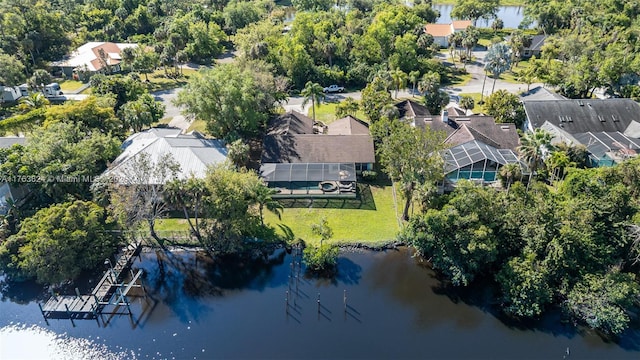 drone / aerial view with a residential view and a water view