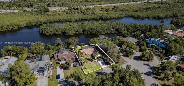 bird's eye view with a water view