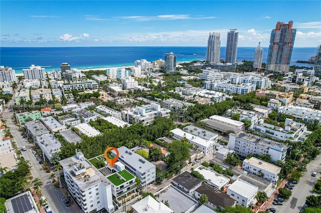 bird's eye view featuring a city view and a water view