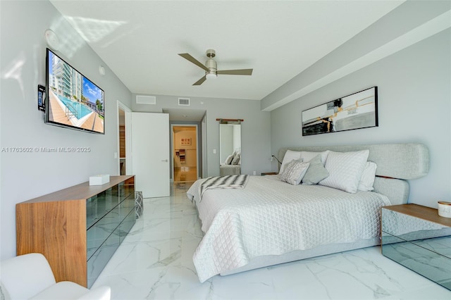 bedroom with visible vents, marble finish floor, and ceiling fan