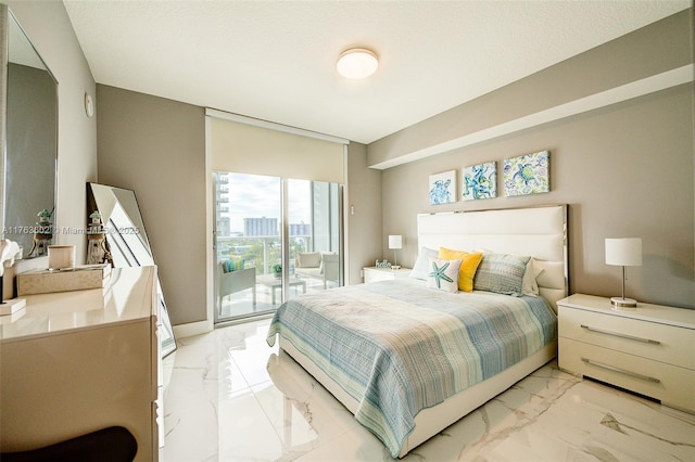 bedroom featuring marble finish floor, access to exterior, and floor to ceiling windows