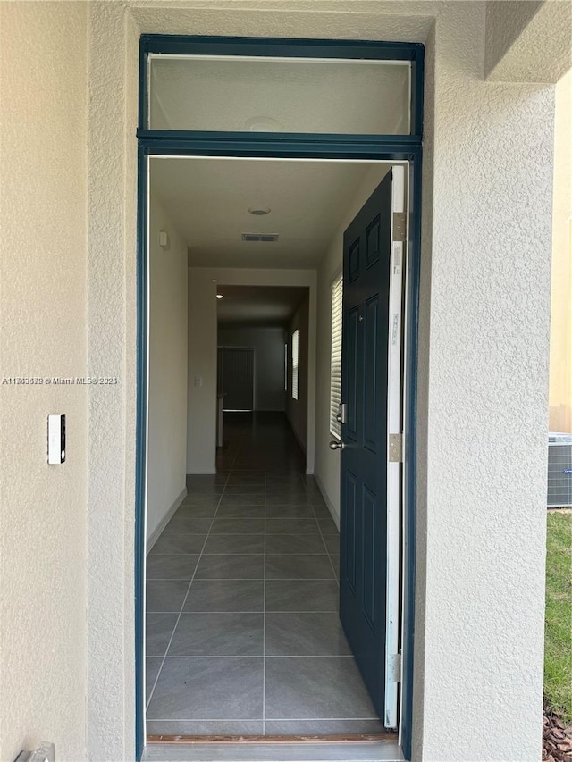 hallway featuring visible vents