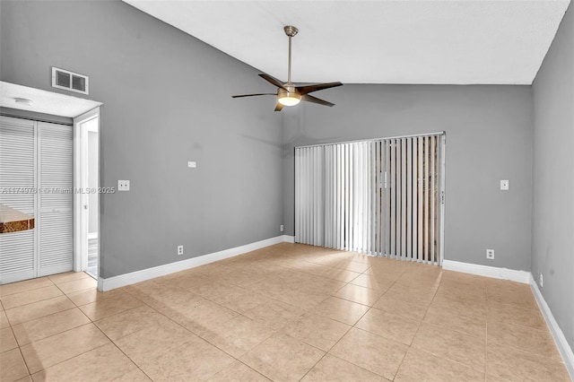 unfurnished room featuring light tile patterned floors, baseboards, visible vents, high vaulted ceiling, and ceiling fan