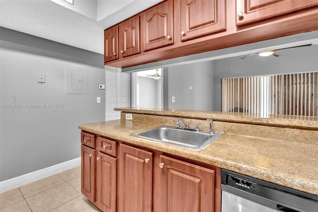 kitchen with dishwasher, light countertops, light tile patterned flooring, a ceiling fan, and a sink