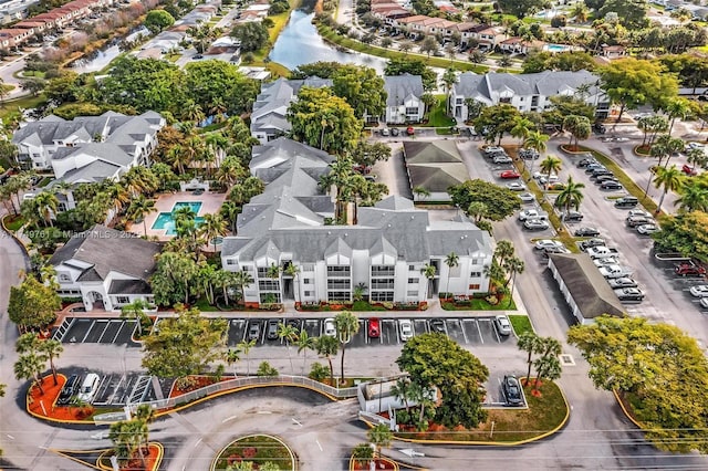 aerial view with a residential view and a water view