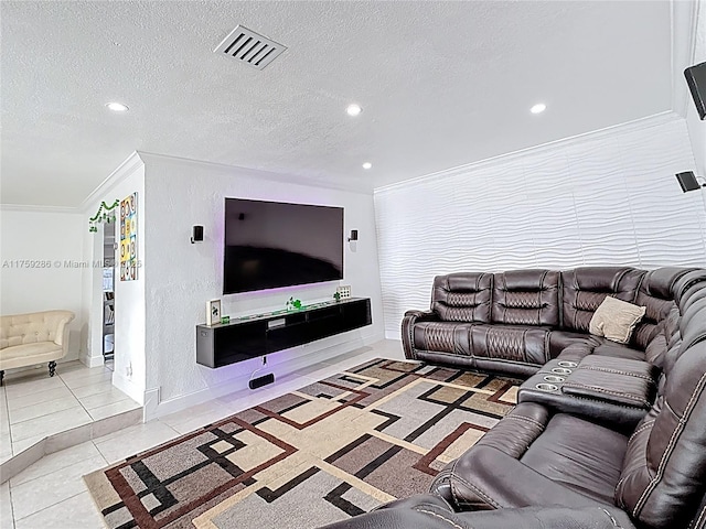 living area featuring tile patterned floors, visible vents, a textured ceiling, and recessed lighting